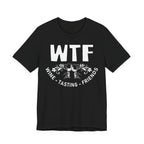 Black t-shirt with 'WTF Wine Tasting Friends' text and graphics on a white background