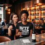 Two women at a bar, one holding a glass of wine and the other with a 'WTF Wine Tasting Friends' shirt.